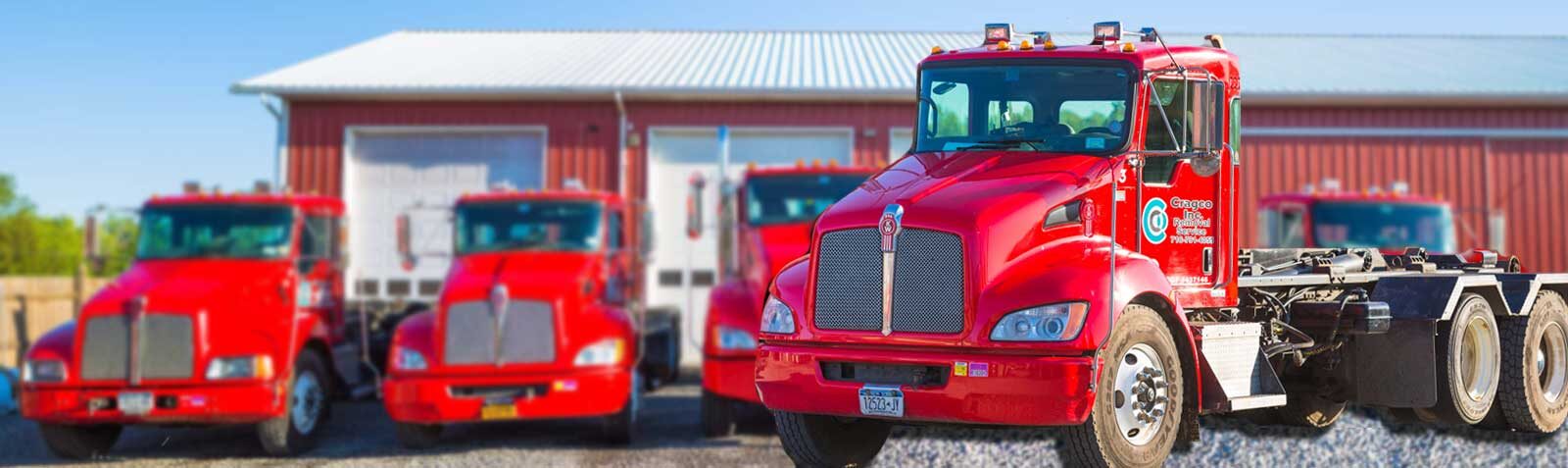 Cragco roll-off dumpster delivery truck in Buffalo, NY